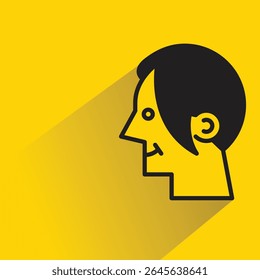 man face with shadow on yellow background
