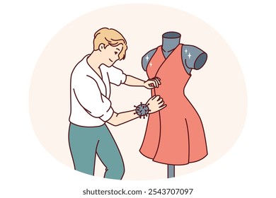 Man fashion designer sews dress fixed on mannequin preparing women outfit for Paris haute couture week. Professional fashion designer makes exclusive elegant clothes for girls to order