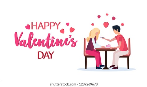 man feeding attractive woman with cake in cafe happy valentines day holiday celebration concept couple in love over red heart shapes greeting card horizontal isolated flat