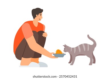 Man feeding a domestic cat with cat food in bowl