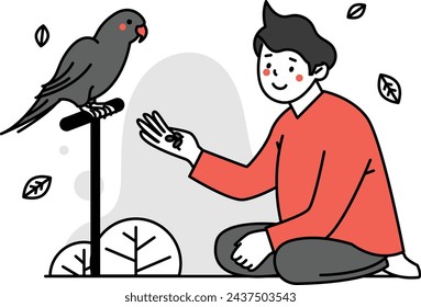A man feeds his pet bird