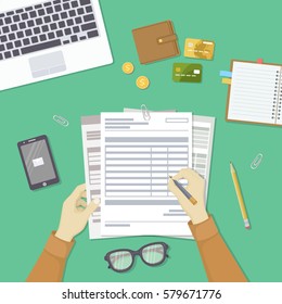 Man filling documents. Men's hands hold the accounts, payroll, tax form. Workplace with papers, blanks, laptop, phone with message, wallet, credit cards, coins, notebook, glasses, pen. Top view Vector