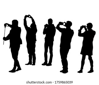 Man filming a television report on a camcorder. Isolated silhouettes on a white background