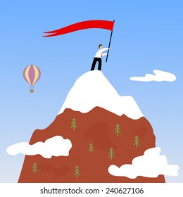 Man with flag on the mountain