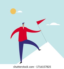 Man with flag on mountain peak 