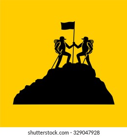 Man with flag standing on top of the mountain.