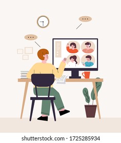 Man freelancer. Sit at the desk and have a video conference. Telecommuting at home.
