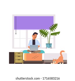 man freelancer using laptop working at home during coronavirus quarantine self-isolation freelance social distancing concept full length vector illustration