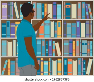 Man in front of bookshelf reaching for book