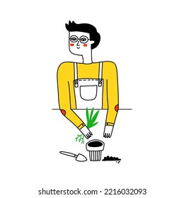 Man gardener planting a flower in a pot. Gardening concept.