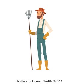 Man Gardener Standing with Rake, Cheerful Male Farmer Character in veralls Working at Garden or Farm Vector Illustration