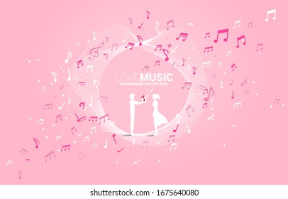 el hombre entrega caja de regalo a la novia con nota de música voladora. Concepto de fondo para el tema del concierto de música de canciones y de amor.