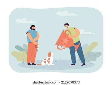 Man giving prize to dog for winning in competition. Happy female owner receiving gold cup for first place flat vector illustration. Victory concept for banner, website design or landing web page