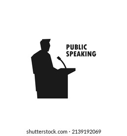 Man giving public speech on podium black vector silhouette illustration.