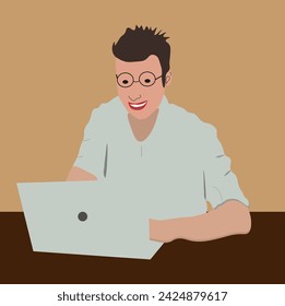 A man with glasses is working on a laptop