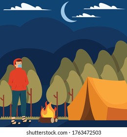 Un hombre acampando solo en el bosque mientras sigue usando mascarilla médica