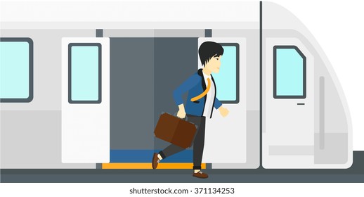 Man going out of train.