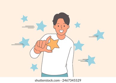 Man with gold star symbolizes success in business and professional talent allowing make best choice. Smiling guy with star gives excellent rating after using service or purchasing product