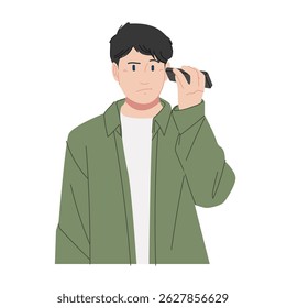 Um homem de roupa exterior verde está ouvindo o áudio em seu gadget intencionalmente, colocando o gadget em seu ouvido por causa do ambiente barulhento