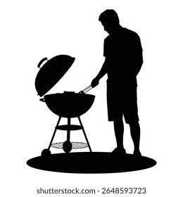Man grilling food on a charcoal barbecue grill silhouette