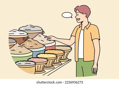 Man at grocery market asks price of condiments. Male buyer chooses ingredients for lunch. Guy wants to buy grits, cereals for home cooking. Food shopping. Vector linear colored illustration.
