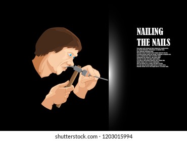 A man hammers a nail on a nail