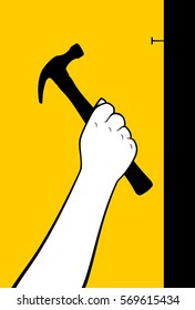 Man hand hammering nail on wall