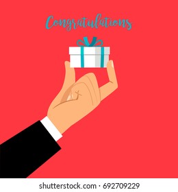 Man hand holding gift box with congratulations text. vector illustration