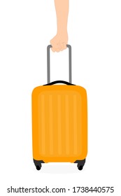 man hand is holding an Orange​ Travel bag. Vacation time around the world. Enjoy international trip. Tourism, Journey concept