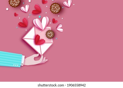 Man hand with love hearts as love massages. Share your love. paper cut style. Valentines day. 14 February