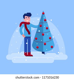 man has prepared Christmas tree for the holiday.winter landscape with standing in the snow smiling guy that showing decorated with red balls tree.winter design for Christmas and New Year for celebrate