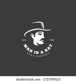 Man in a hat logo design template for a dark background. Vector illustration.