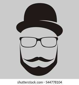 A man in a hat with a mustache , glasses and a beard