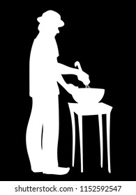 Man in hat prepares food. Guy standing, stirring ingredients in bowl. Vector illustration of white silhouette of man cooks cookies isolated on black background. Stencil. Concept.