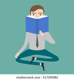Man having a great idea while reading a book.