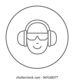 Man in headphones line icon.