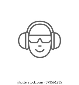 Man in headphones line icon.