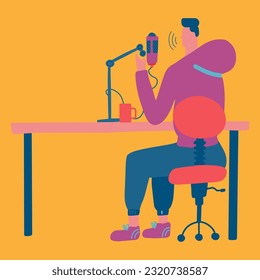 man in headphones sitting at a table talking into a microphone