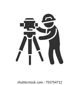 a man in a helmet and theodolite