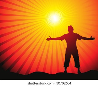 Man with his arms wide open in sun lite  background