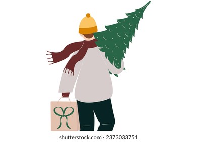 A man with his back turned carries a Christmas tree on his shoulders and holds a package in his hand