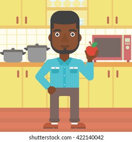Man holding apple.