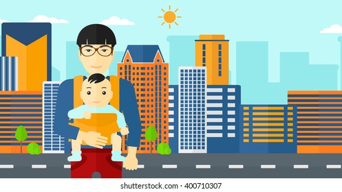 Man holding baby in sling.