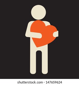 man holding big love heart