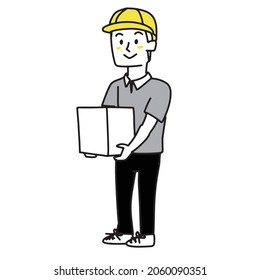 A man holding a cardboard baggage