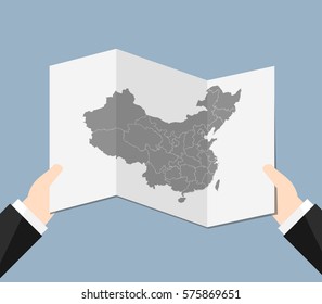 Man Holding a China Map 