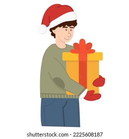 Man holding Christmas gift. Young happy man in santa hat holding a yellow gift box. 