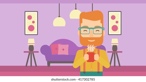 Hombre sosteniendo una taza de café.