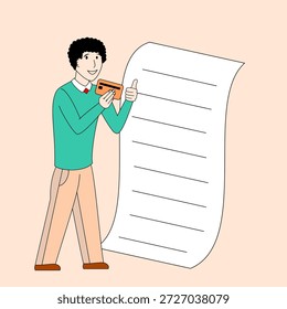 Un hombre sostiene una tarjeta de débito y sonríe a una hoja de papel blanca. Concepto de logro o satisfacción, ya que es probable que el hombre haga una compra o complete una tarea