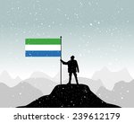 man holding a flag of Sierra Leone, vector 